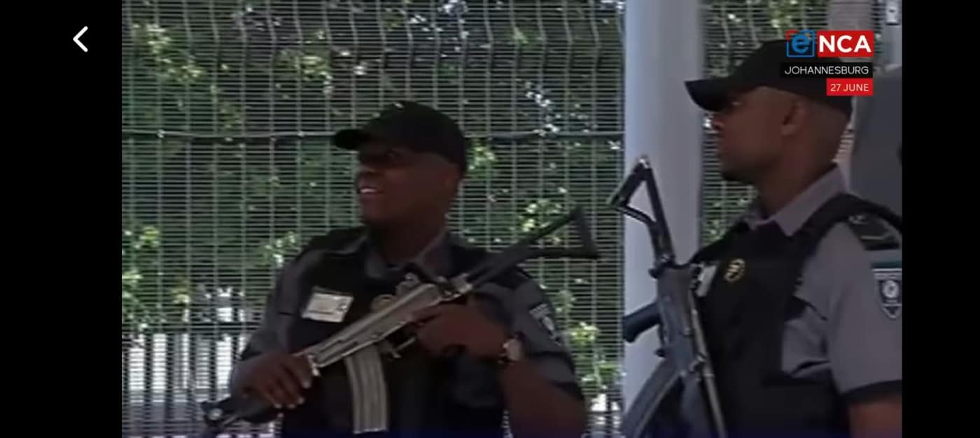 TT Crimeshield officers on armed duty, covered in a national news broadcast