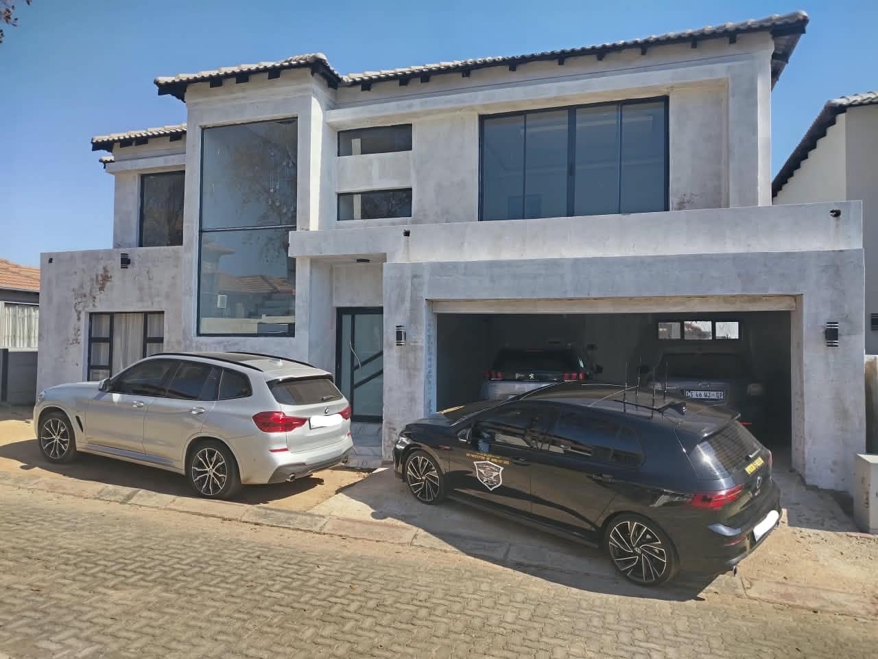 Escort vehicles at a private residence