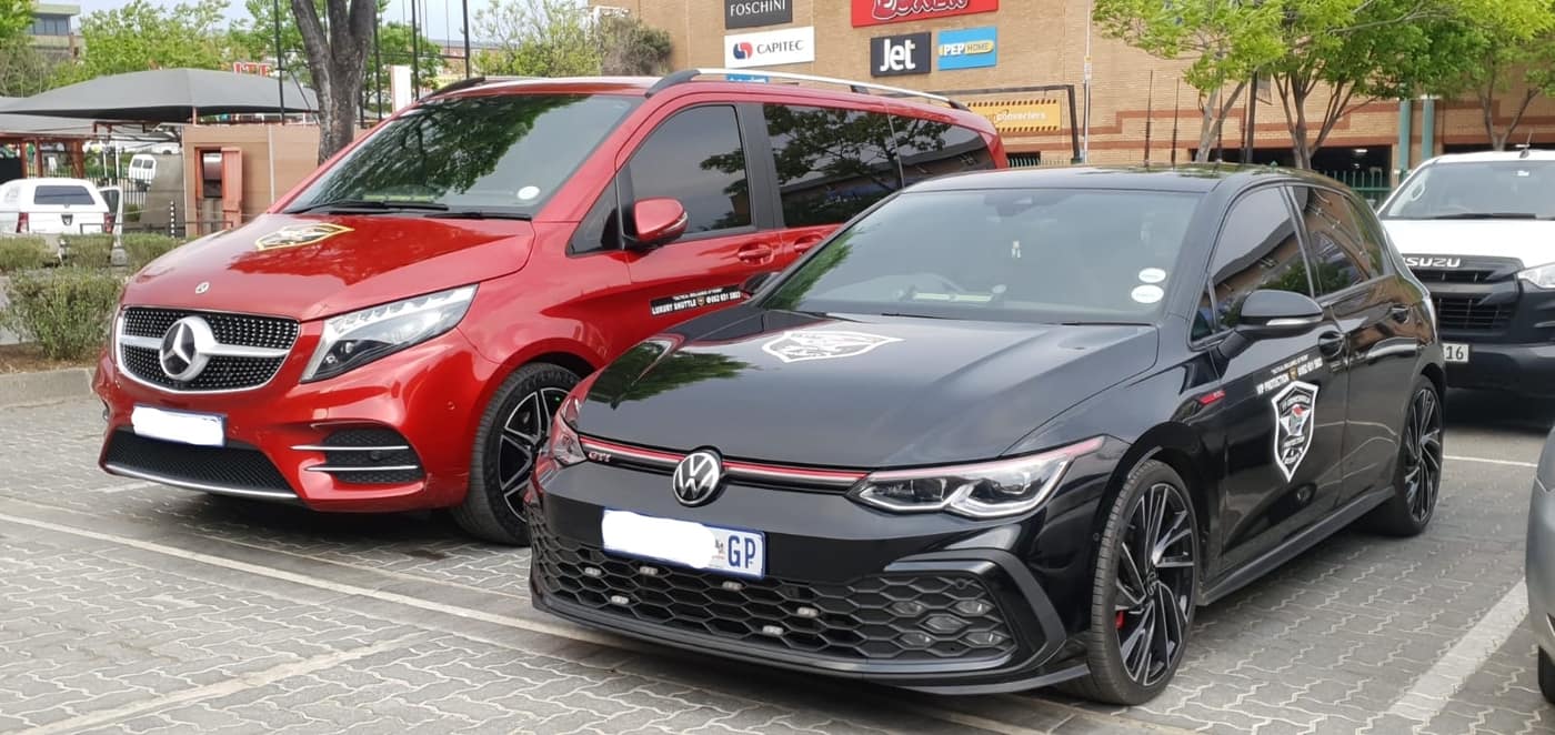 Client vehicle and escort staged together
