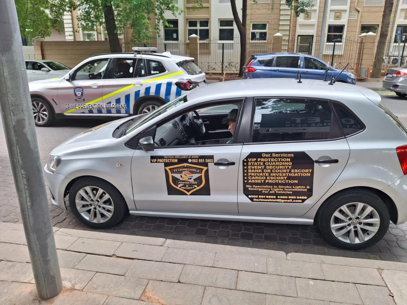 TT Crimeshield response vehicle alongside SAPS in the CBD