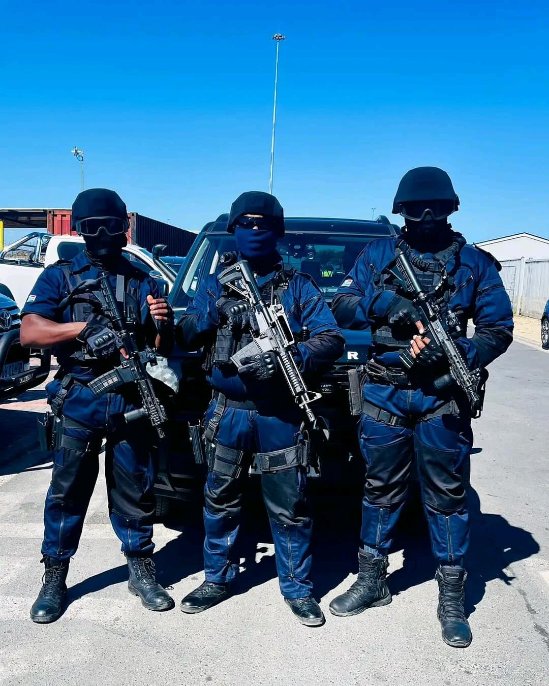 Tactical team in navy kit before a task