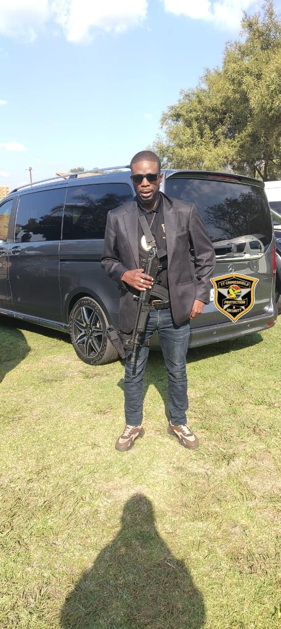Close protection officer in business dress with the V-Class